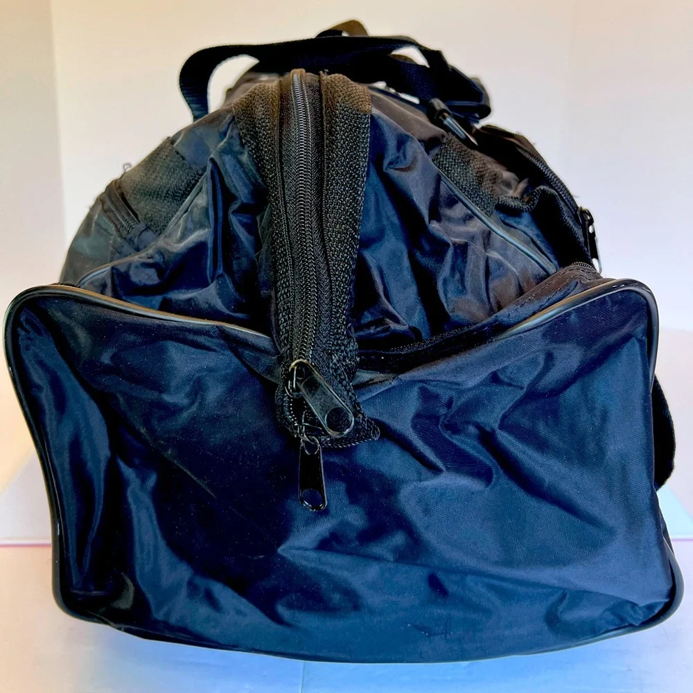 Stylish Vintage Dark Black Duffel Bag with Many Pockets. New without Tags.